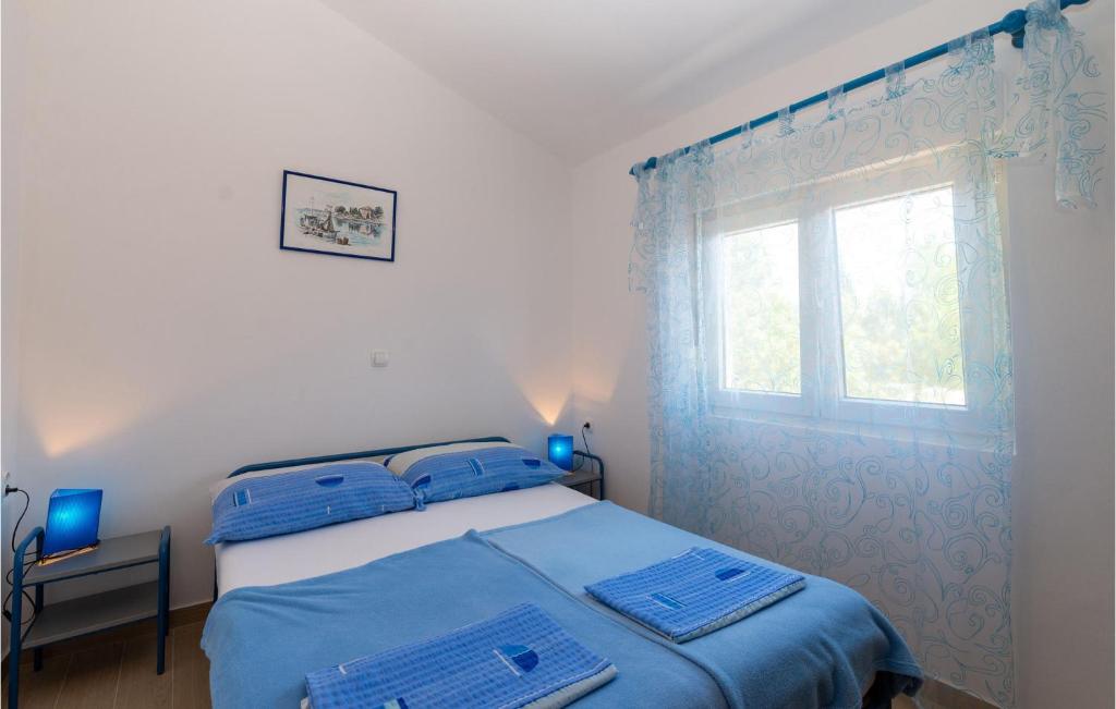 Posteľ alebo postele v izbe v ubytovaní Holiday Home Don Ante Adzije Iii