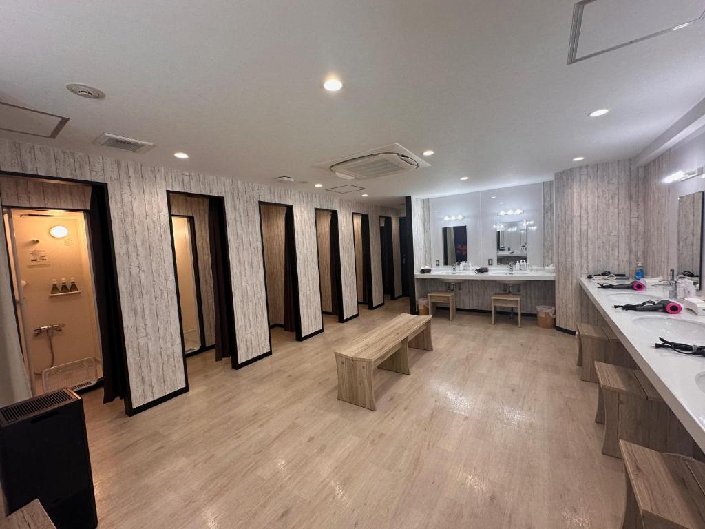 TV a/nebo společenská místnost v ubytování Hotel Capsule Inn Shizuoka
