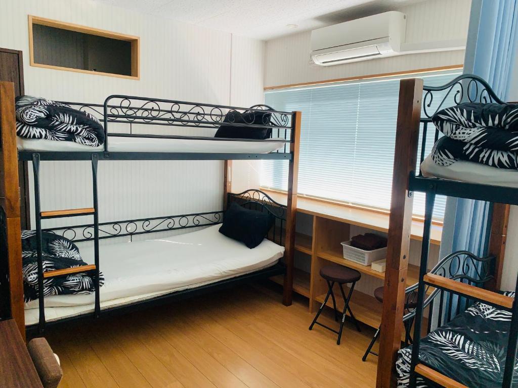 Postel nebo postele na pokoji v ubytování Village BFH