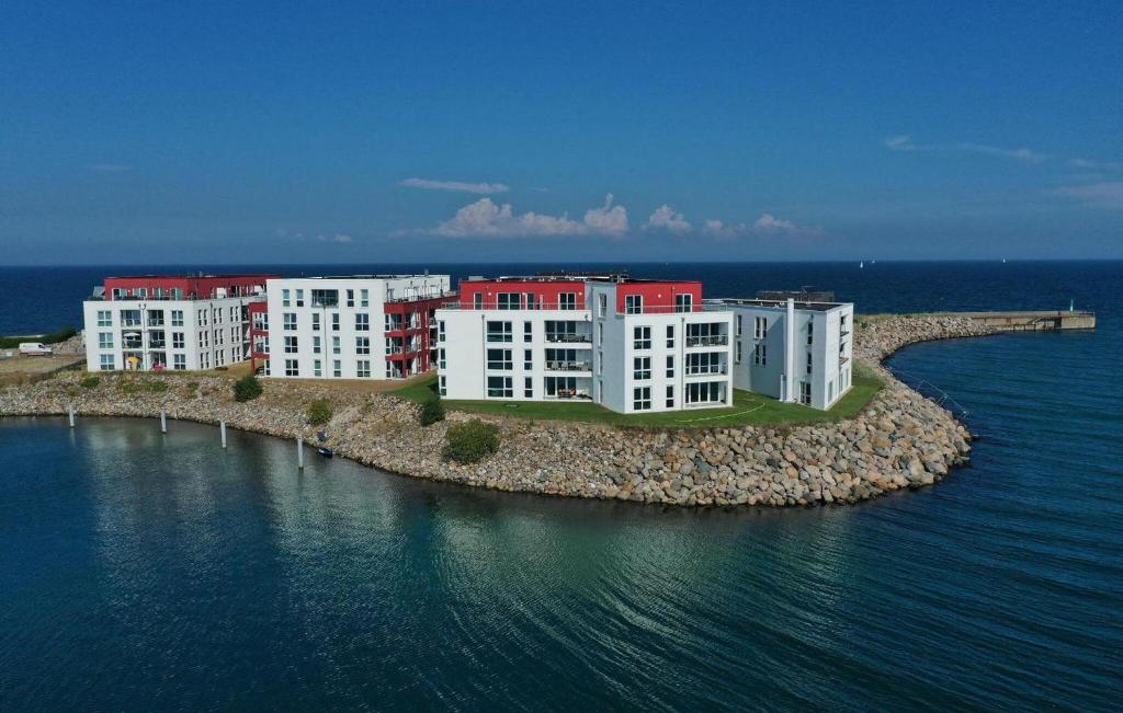 a building on an island in the water at Schleieck in Kappeln