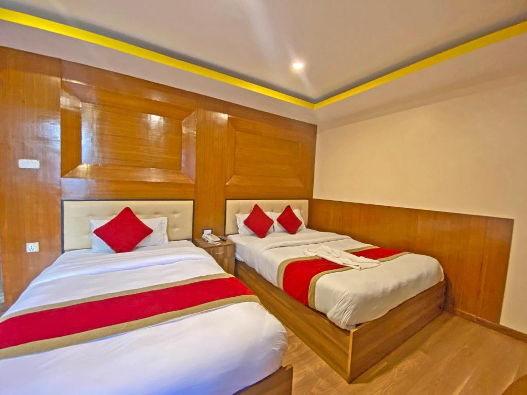 Postel nebo postele na pokoji v ubytování Hotel Airport Holiday