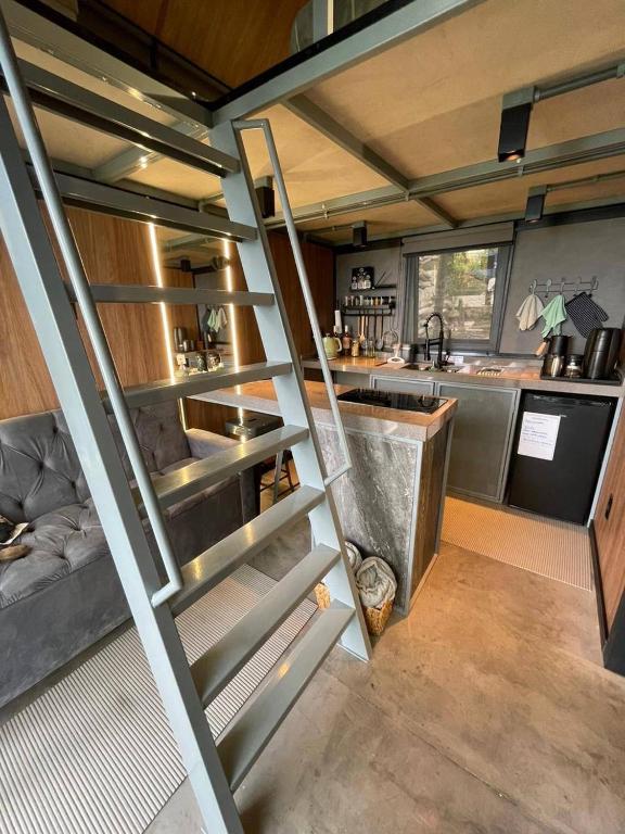 Kuchyň nebo kuchyňský kout v ubytování VISTA MAR - Tiny House Sattva - Florianópolis, SC