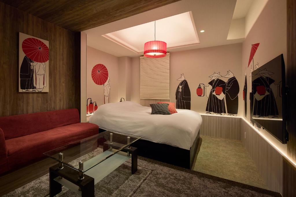 Postel nebo postele na pokoji v ubytování Nagoya Hotel HOQA Hanaironoyu