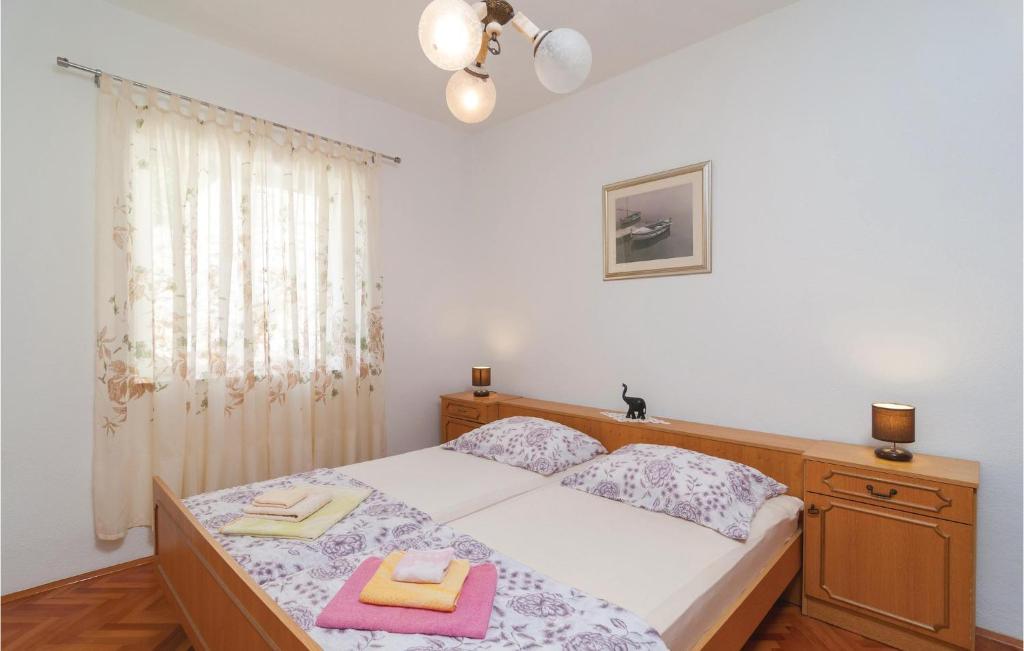 Posteľ alebo postele v izbe v ubytovaní Lovely Home In Pucisca With Jacuzzi
