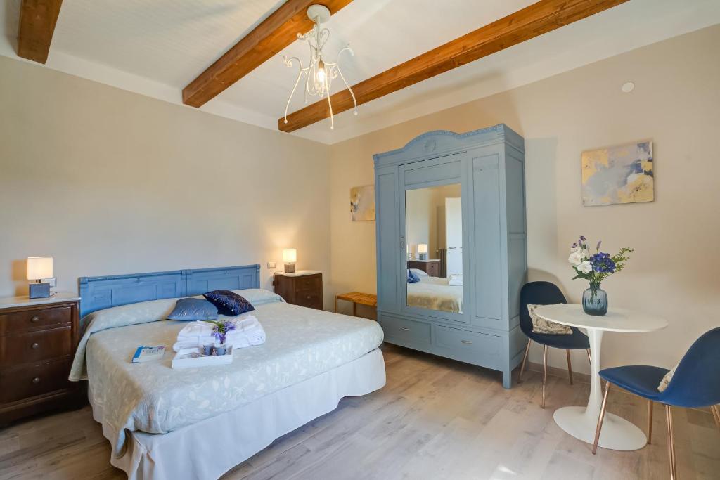 Posteľ alebo postele v izbe v ubytovaní Tuscan Home S Margherita Private Outdoor - Happy Rentals