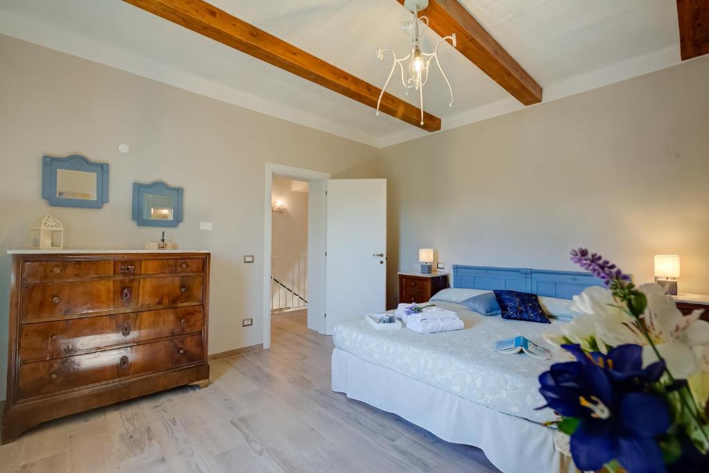 Posteľ alebo postele v izbe v ubytovaní Tuscan Home S Margherita Private Outdoor - Happy Rentals