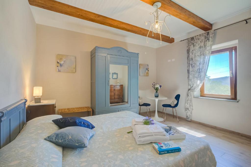 Posteľ alebo postele v izbe v ubytovaní Tuscan Home S Margherita Private Outdoor - Happy Rentals