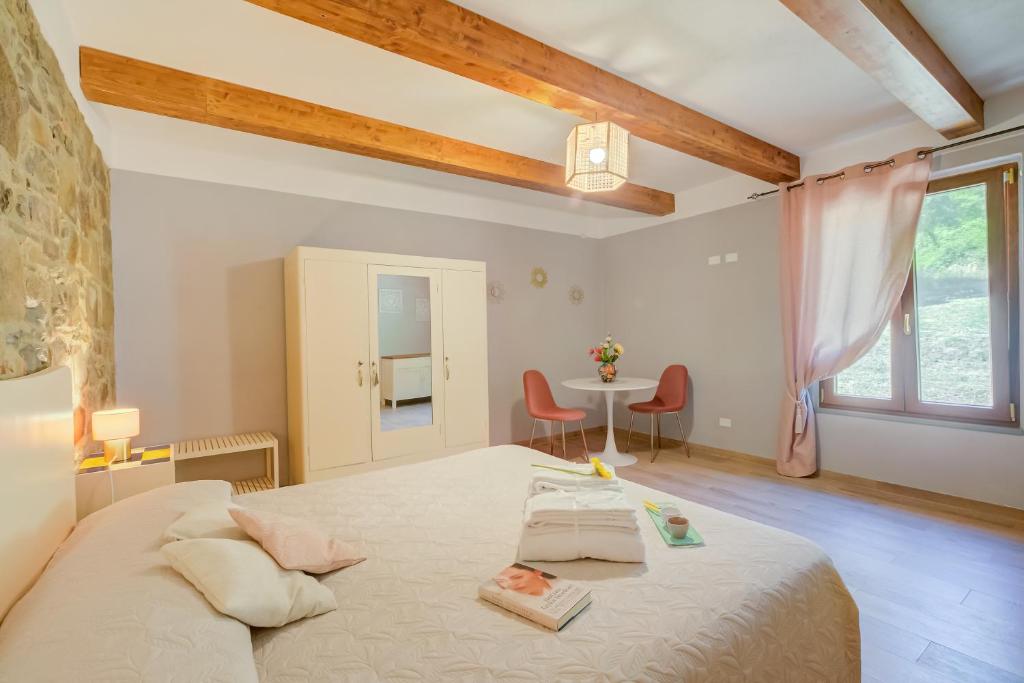 Posteľ alebo postele v izbe v ubytovaní Tuscan Home S Margherita Private Outdoor - Happy Rentals