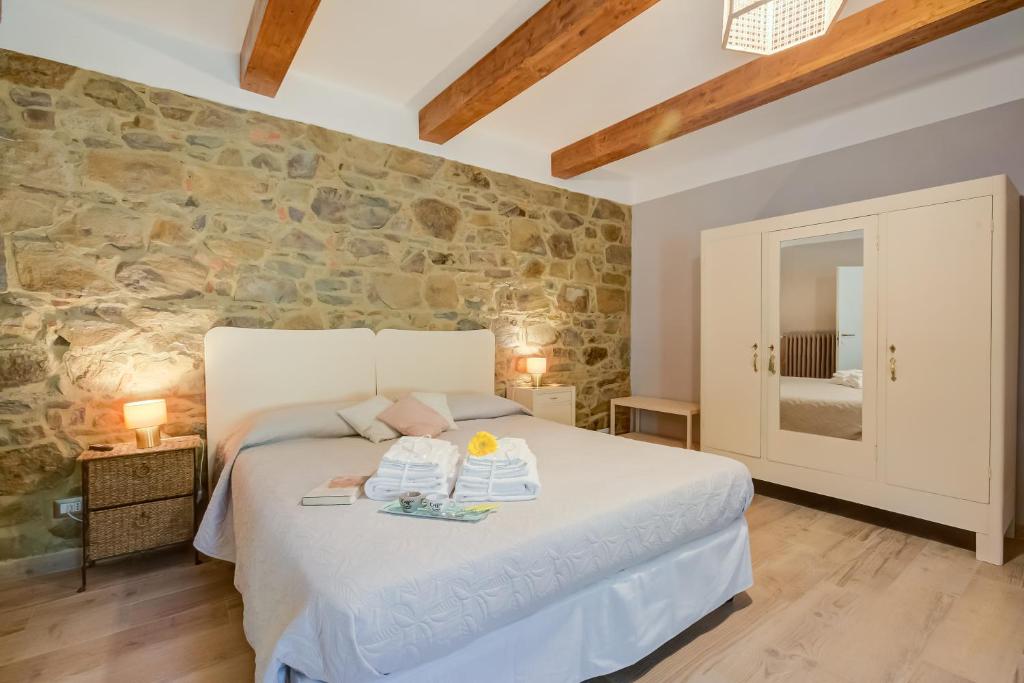 Posteľ alebo postele v izbe v ubytovaní Tuscan Home S Margherita Private Outdoor - Happy Rentals