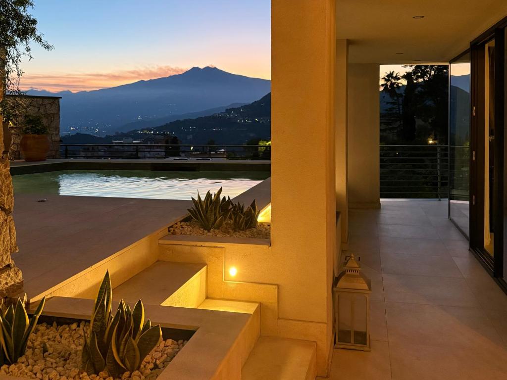a house with a view of a mountain at Villa Ada in Taormina