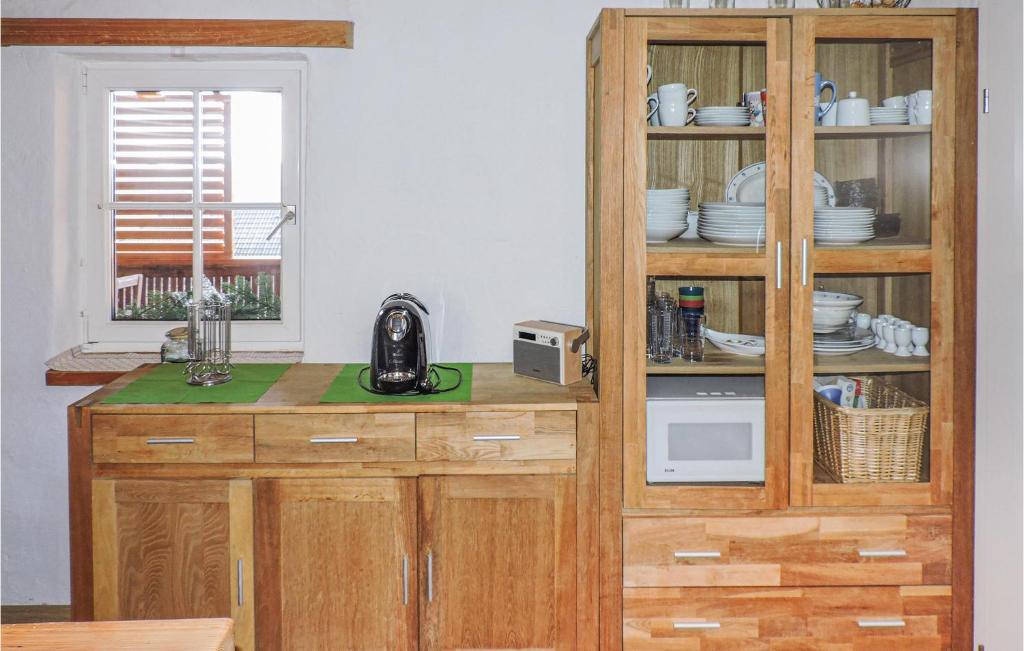 Kuchyňa alebo kuchynka v ubytovaní Ferienhaus Mit Pool Und Sauna