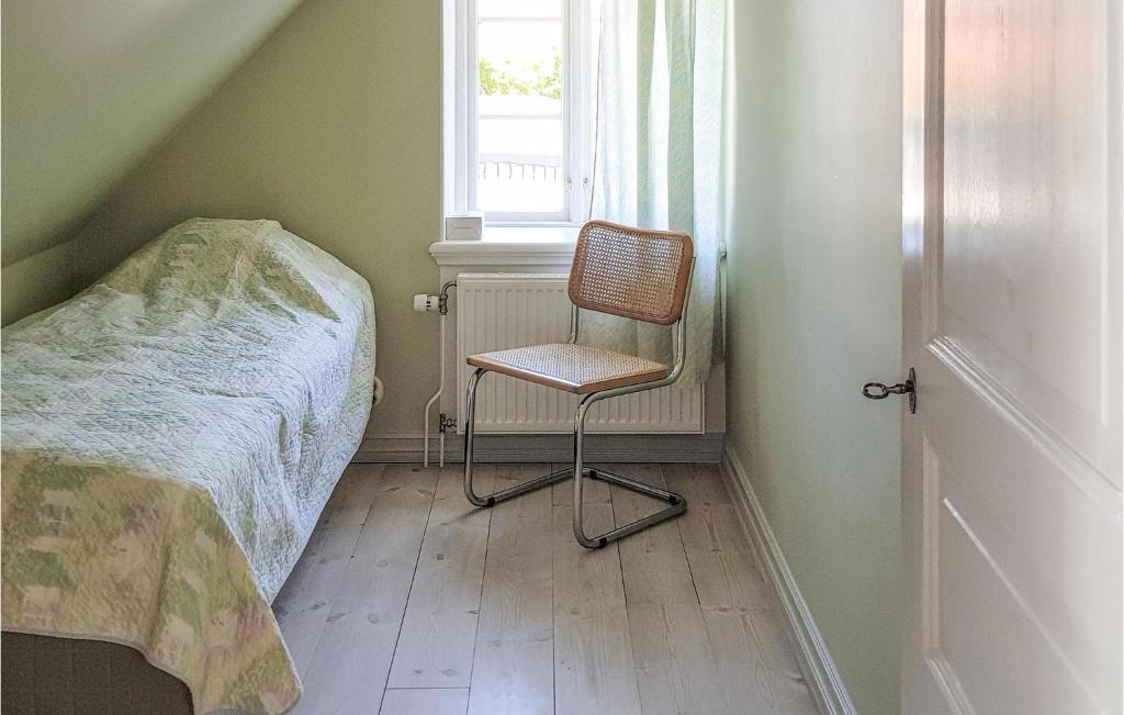 Ένα ή περισσότερα κρεβάτια σε δωμάτιο στο Nice Apartment In Simrishamn With Wifi