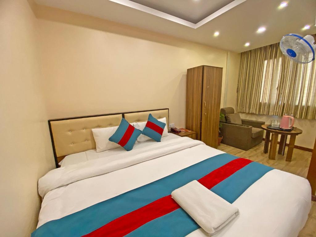 Postel nebo postele na pokoji v ubytování Hotel Airport Holiday