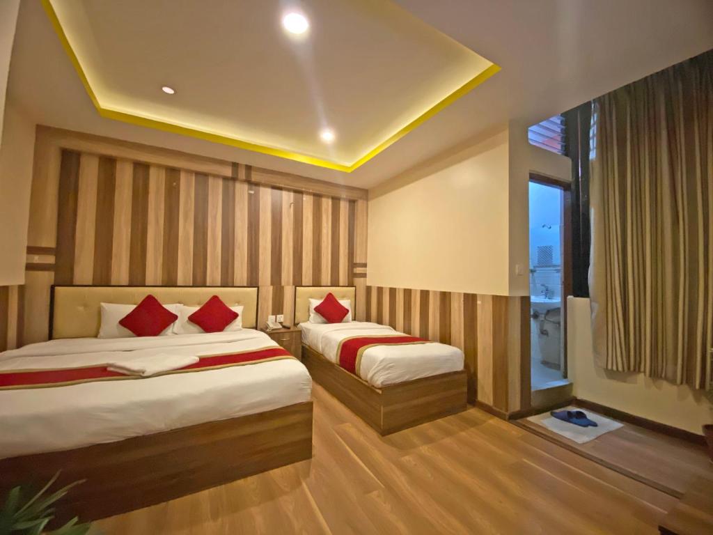 Postel nebo postele na pokoji v ubytování Hotel Airport Holiday