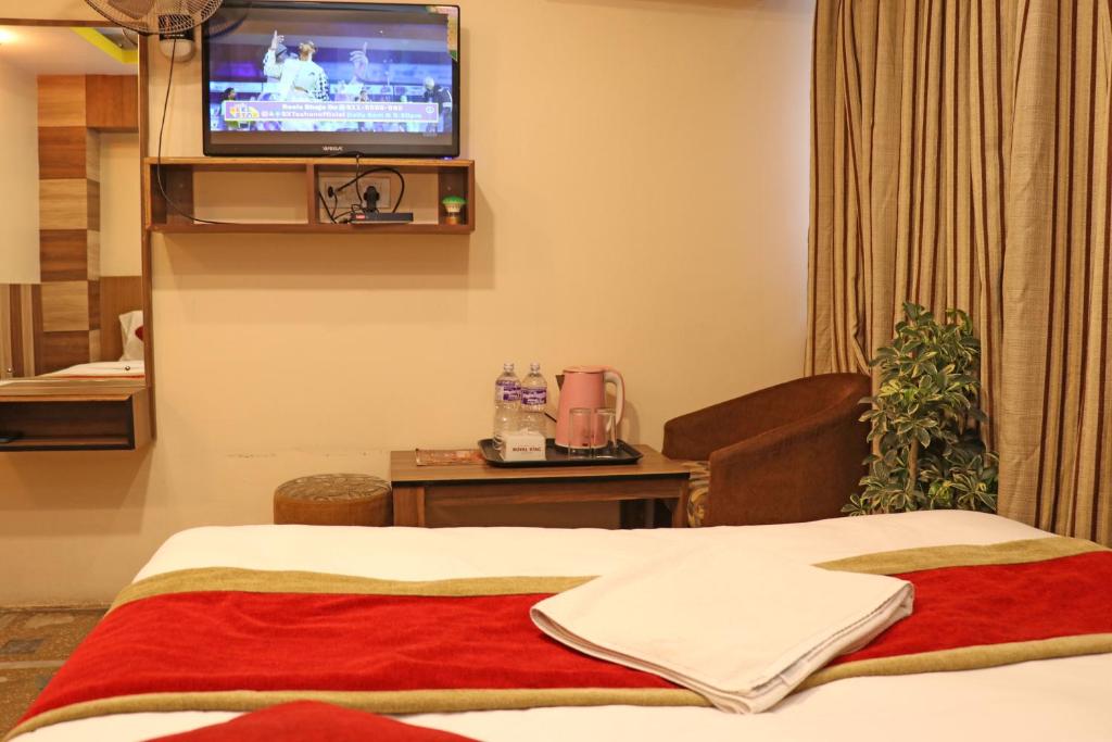 Postel nebo postele na pokoji v ubytování Hotel Airport Holiday
