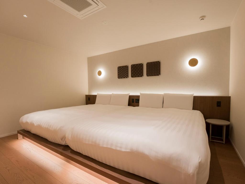 Postel nebo postele na pokoji v ubytování Rakuten STAY TERRACE Hakone Kowakudani
