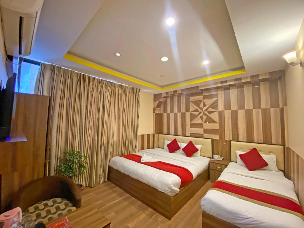 Postel nebo postele na pokoji v ubytování Hotel Airport Holiday