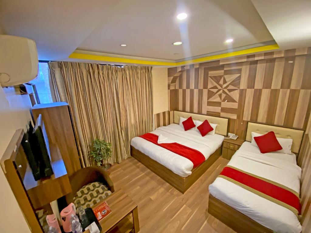 Postel nebo postele na pokoji v ubytování Hotel Airport Holiday