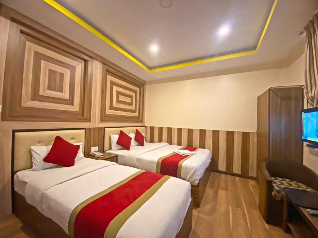 Postel nebo postele na pokoji v ubytování Hotel Airport Holiday