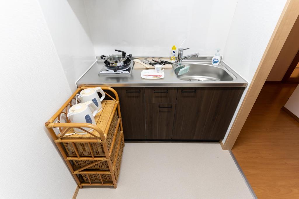 A cozinha ou kitchenette de 大吉屋本館 ワンフロア貸切部屋 名駅離れ