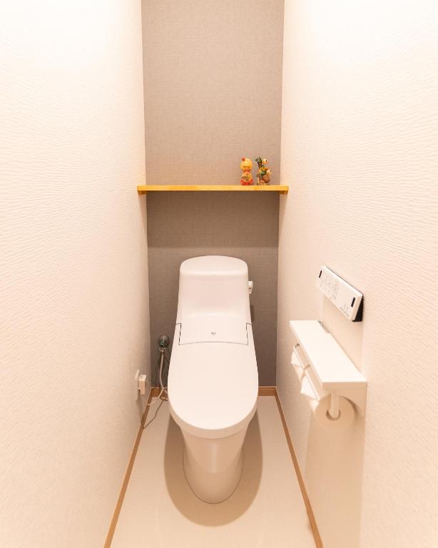 Uma casa de banho em 大吉屋本館 ワンフロア貸切部屋 名駅離れ