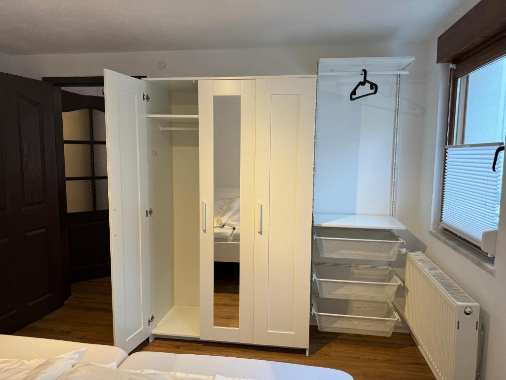 Postel nebo postele na pokoji v ubytování 2 Zimmer Apartment mit kostenlosem Parkplatz