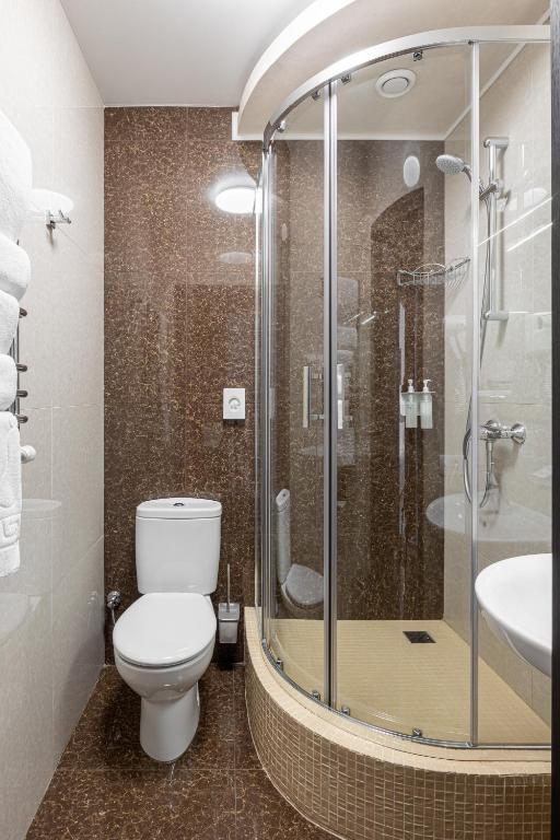 Koupelna v ubytování Helios Hotel & SPA