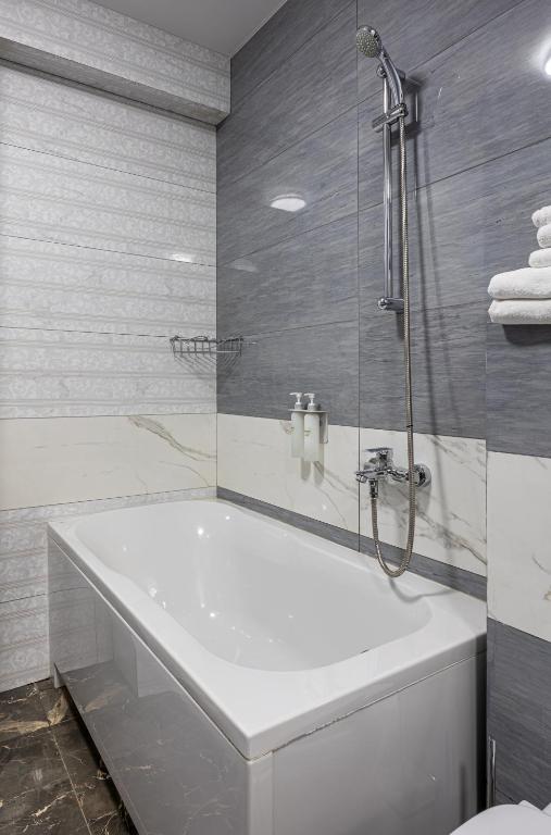 Koupelna v ubytování Helios Hotel & SPA