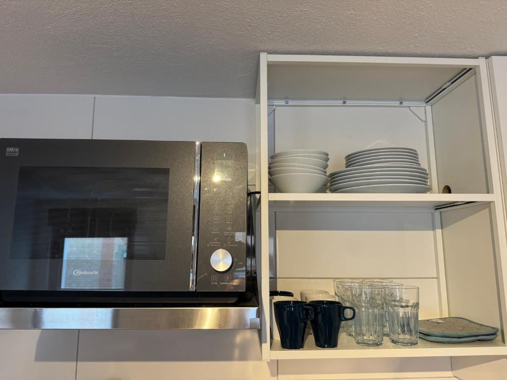 Kuchyň nebo kuchyňský kout v ubytování 2 Zimmer Apartment mit kostenlosem Parkplatz