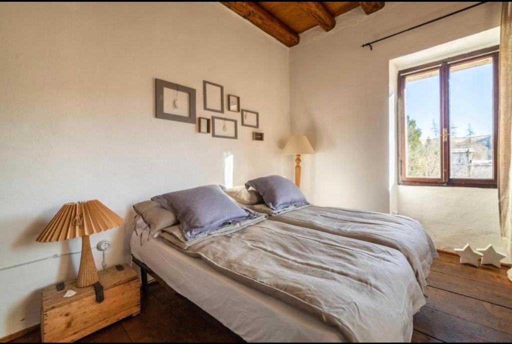 Postel nebo postele na pokoji v ubytování Giulio Mountain B&B