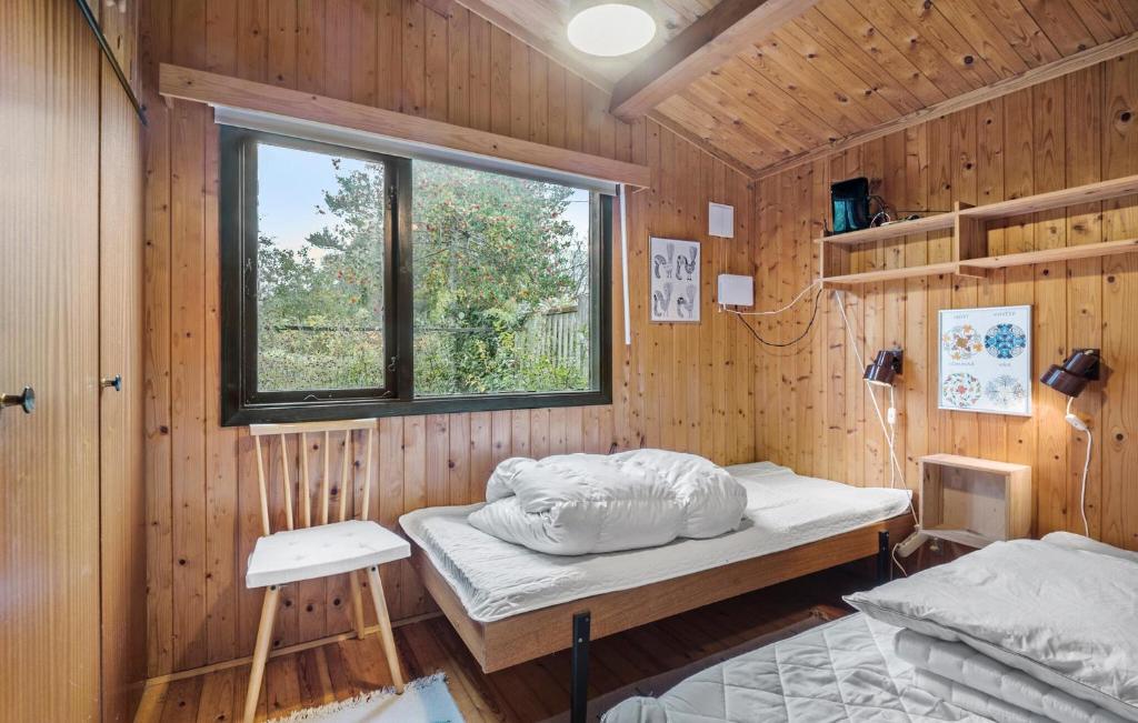 Postel nebo postele na pokoji v ubytování 3 Bedroom Awesome Home In Rødvig Stevns