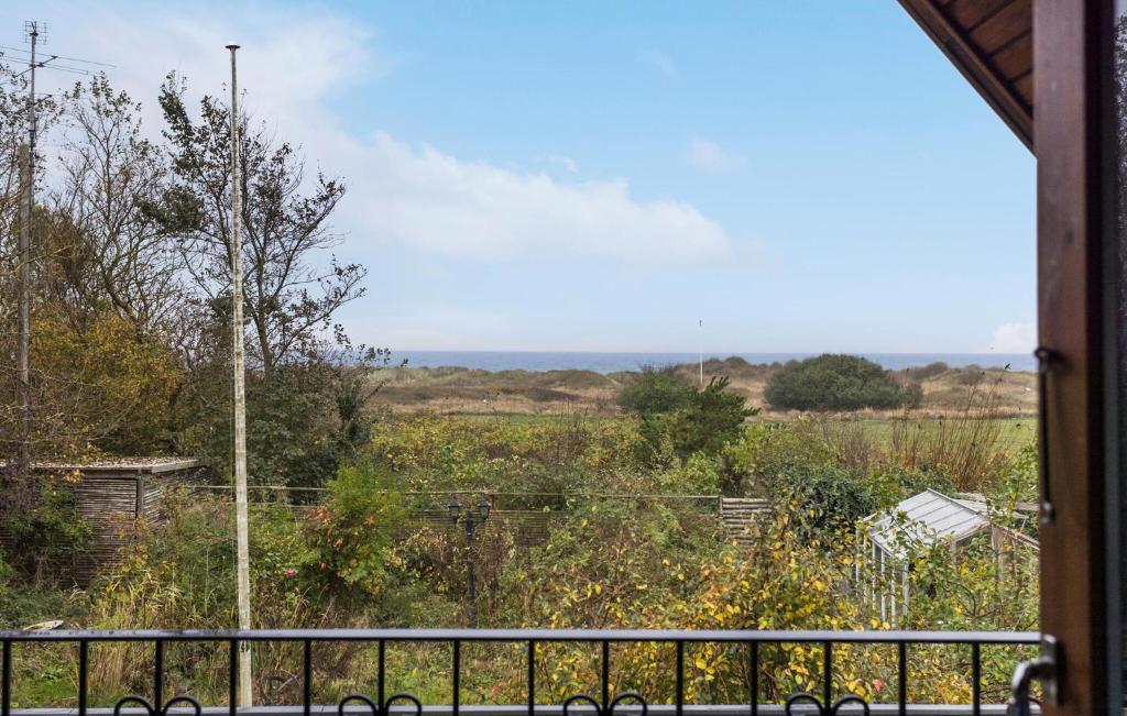 a view of a field from a balcony at 4 Bedroom Stunning Home In Humble in Humble