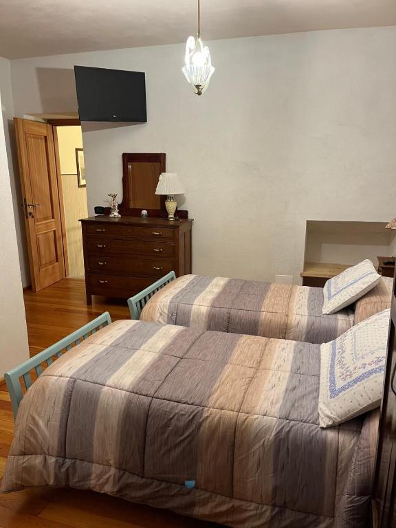 Postel nebo postele na pokoji v ubytování B&B Al Caseificio
