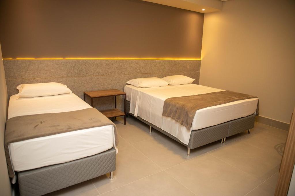 Postel nebo postele na pokoji v ubytování Serravita Hotel