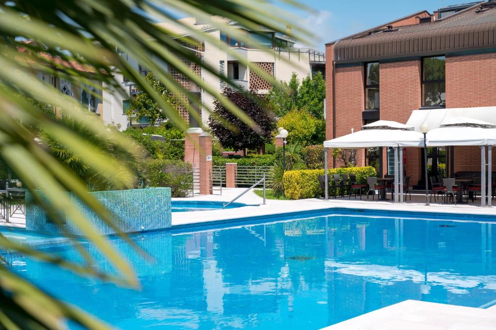 Bazén v ubytování DB Villas Le Ville del Lido Resort nebo v jeho okolí