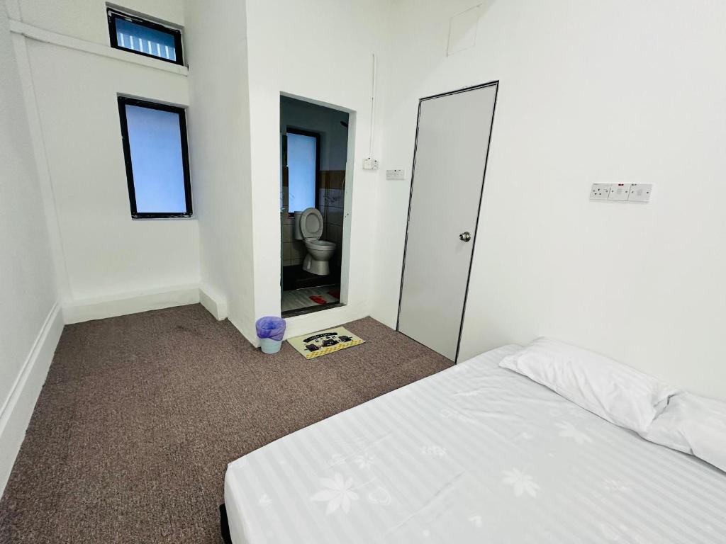 Postel nebo postele na pokoji v ubytování Bright Star Inn