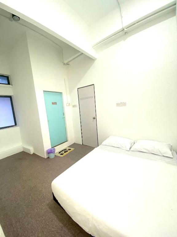 Postel nebo postele na pokoji v ubytování Bright Star Inn