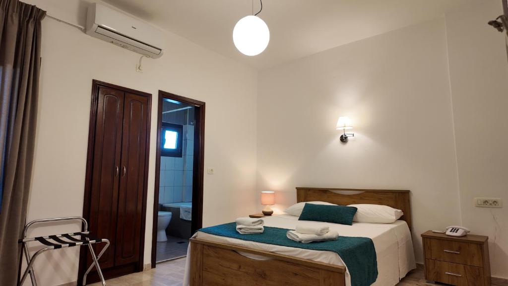 Postel nebo postele na pokoji v ubytování Hotel Marybill