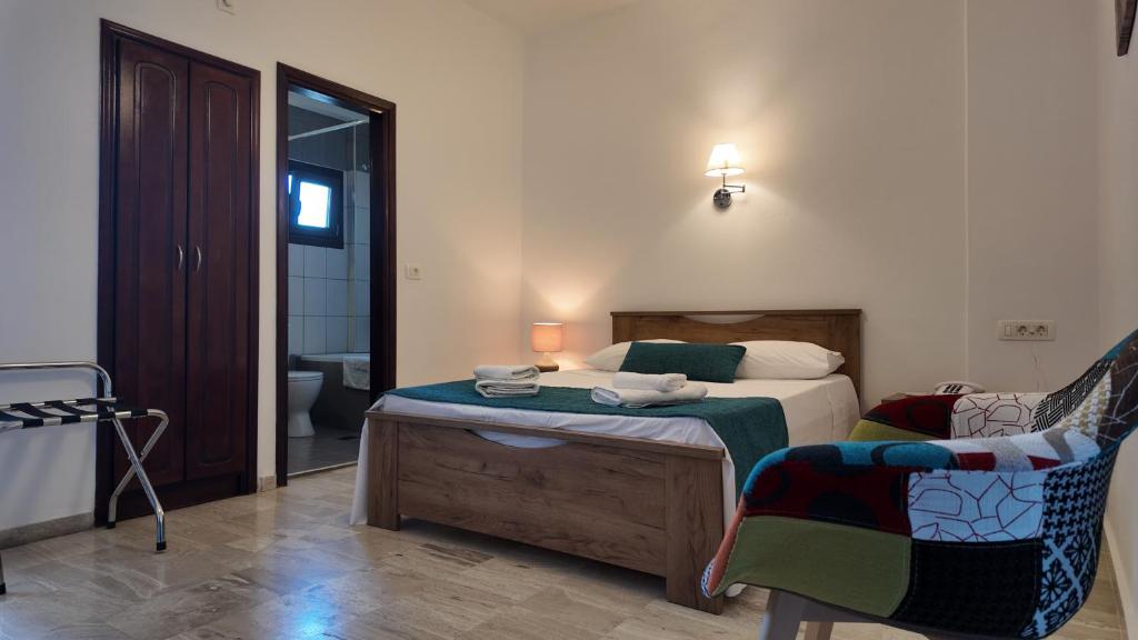 Postel nebo postele na pokoji v ubytování Hotel Marybill