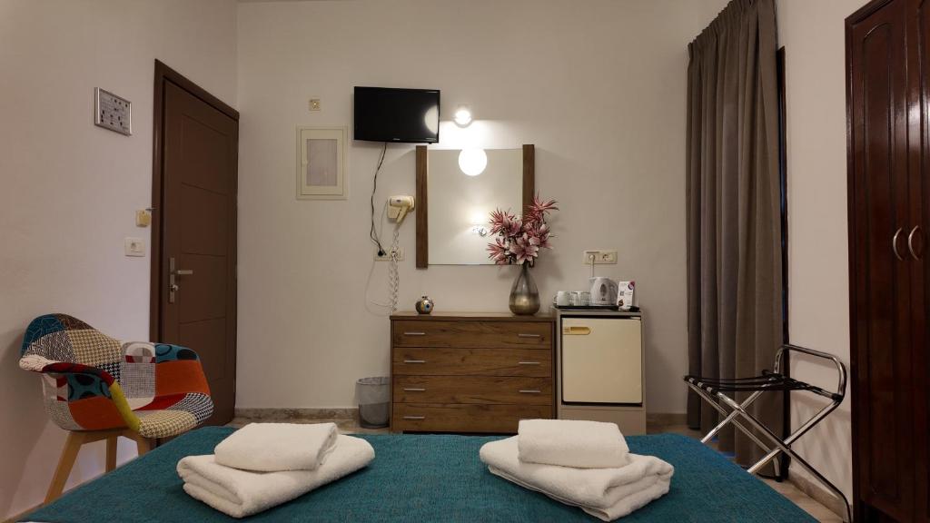 Postel nebo postele na pokoji v ubytování Hotel Marybill