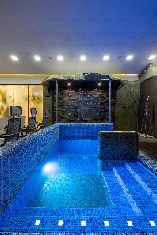 Bazén v ubytování Helios Hotel & SPA nebo v jeho okolí