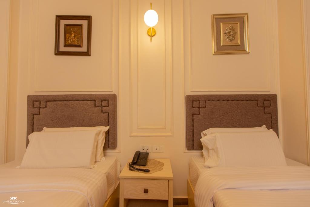 Postel nebo postele na pokoji v ubytování El Farida Hotel