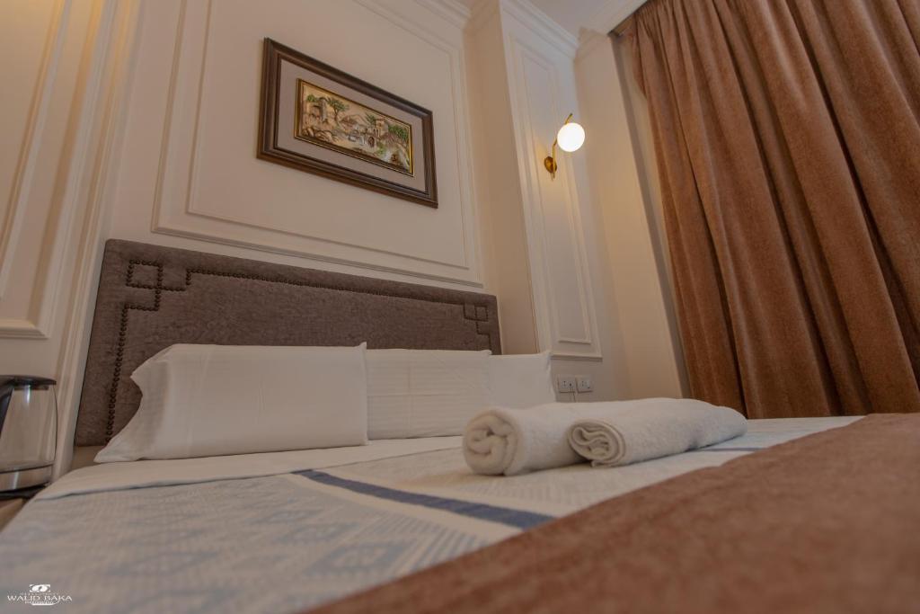 Postel nebo postele na pokoji v ubytování El Farida Hotel
