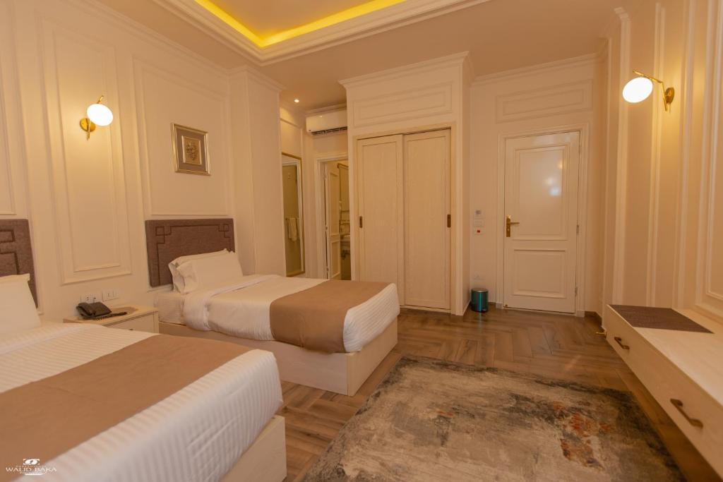 Postel nebo postele na pokoji v ubytování El Farida Hotel
