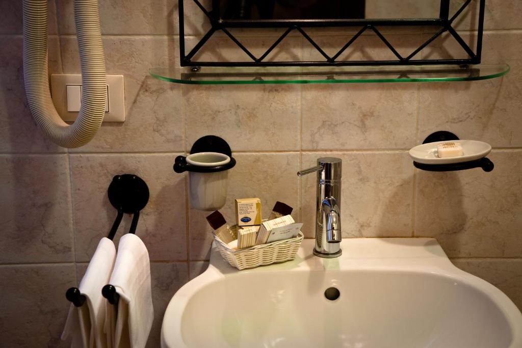 Ванная комната в Hotel Boccascena
