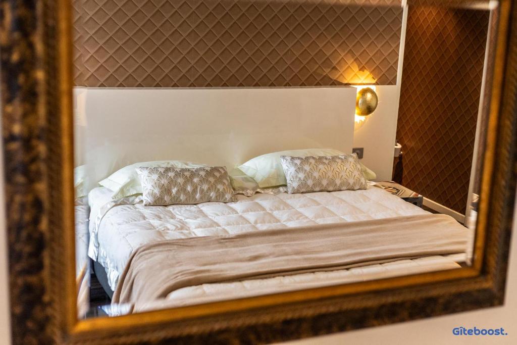 Postel nebo postele na pokoji v ubytování Le Val des Sens
