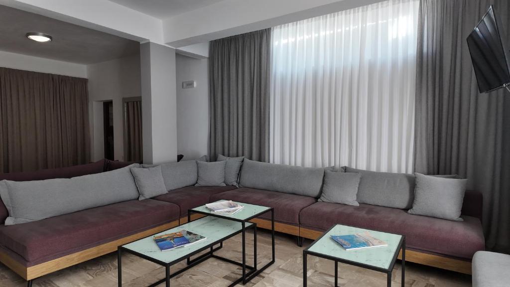 TV a/nebo společenská místnost v ubytování Hotel Marybill