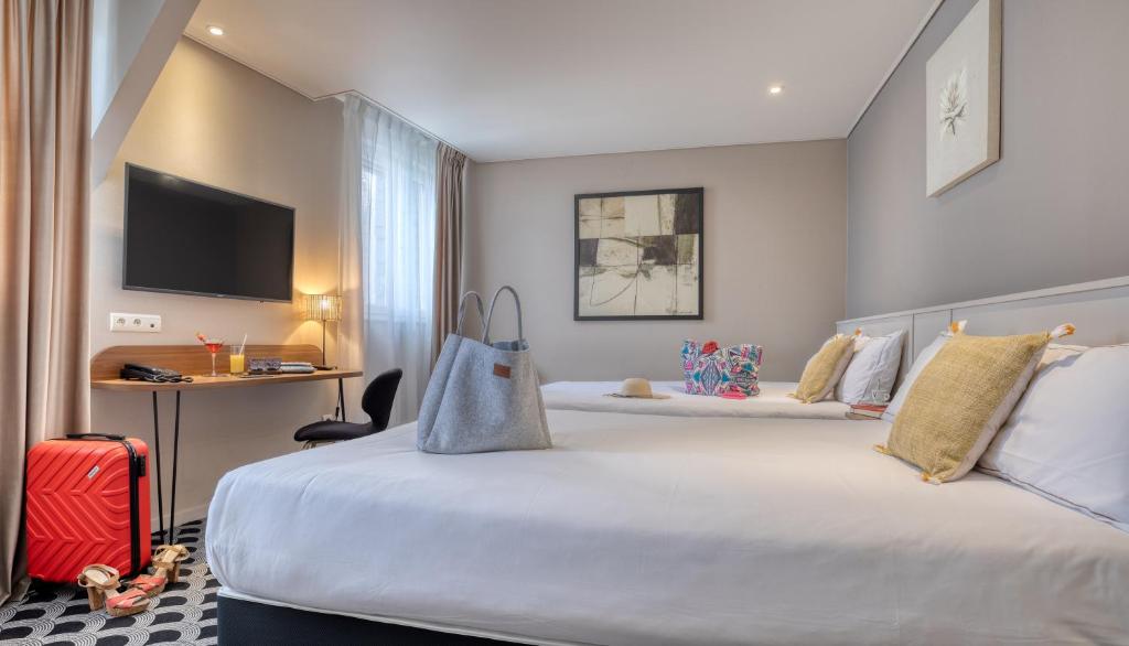 Brit Hotel Les Voyageurs - Camera Familiare