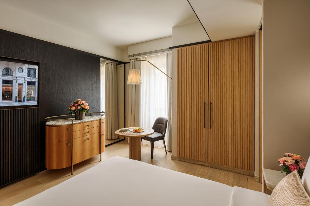 Postel nebo postele na pokoji v ubytování Park Hyatt Milano