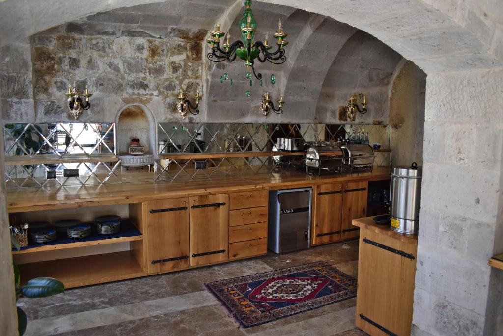 Kuchyň nebo kuchyňský kout v ubytování Göreme Cave Suites